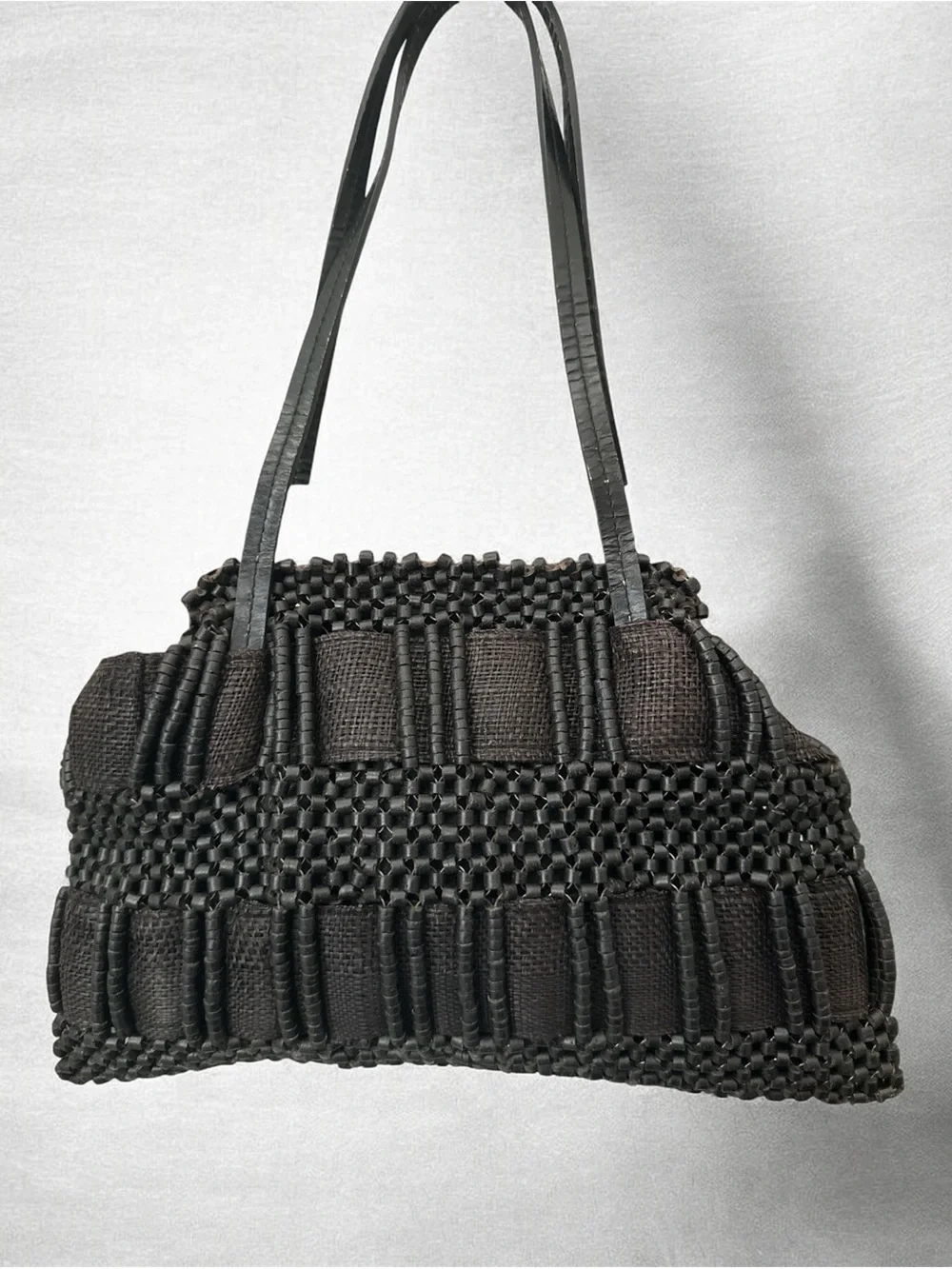Aranaz Antik Batik tote features a wooden frame woven beaded detail and tassel